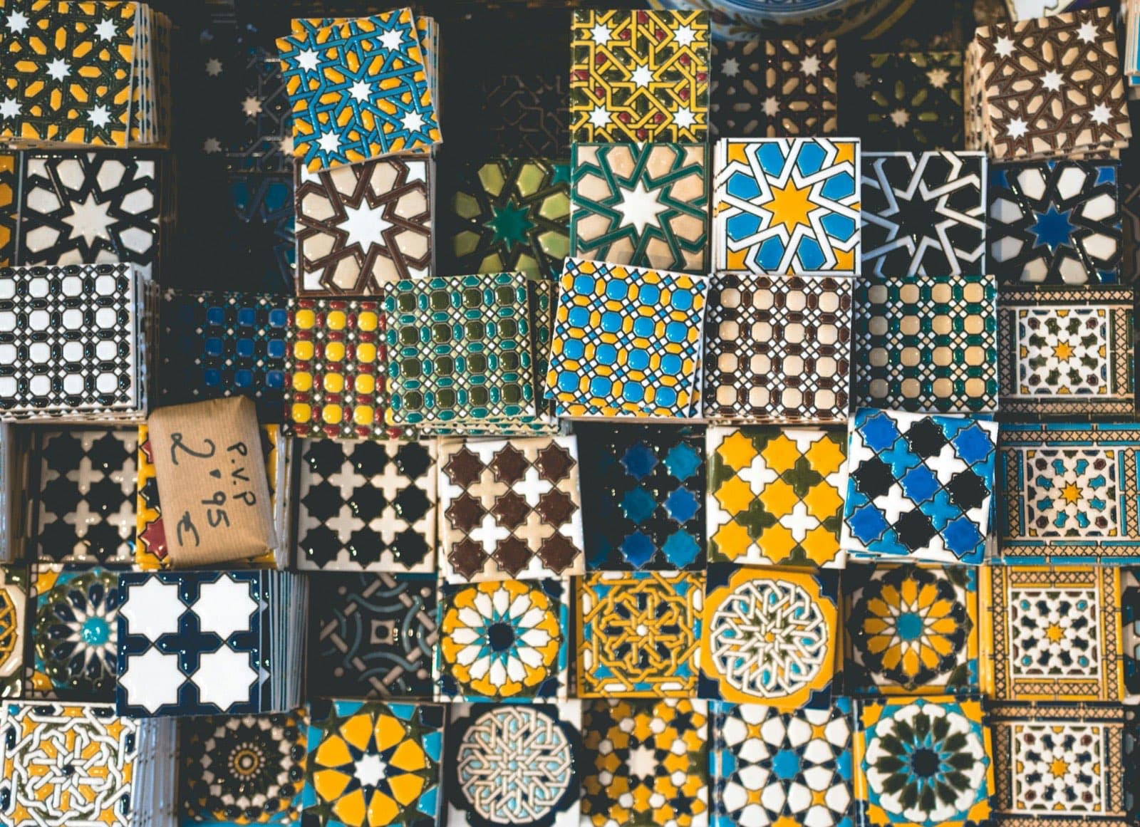 Close-up of colorful ceramic tile samples in different sizes